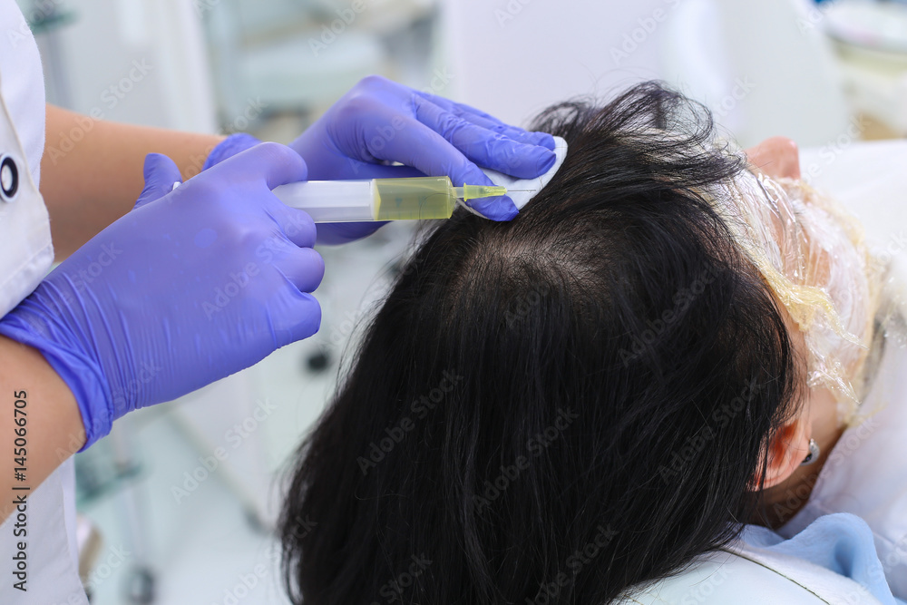 Fototapeta premium Researcher performs blood centrifuging