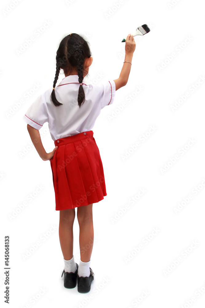 Little girl with a paintbrush, isolated on white background
