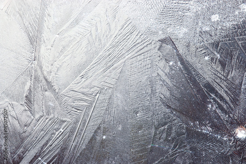 Transparent ice crystals texture cracked background photo