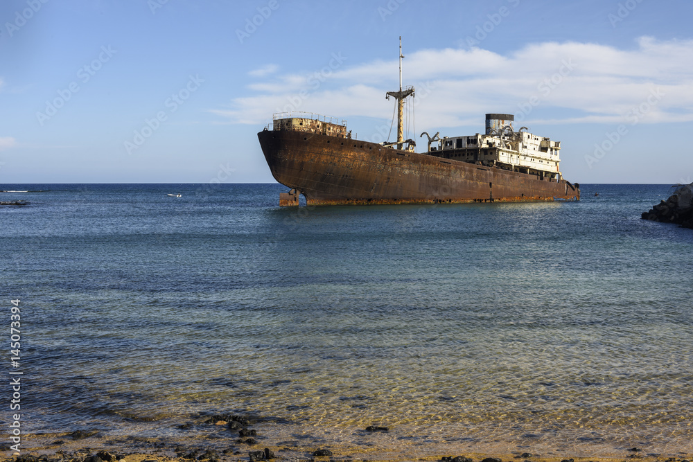 Rusted ship in crystal clear sea, Arrecife, Lanzarote, Canary Islands, Spain