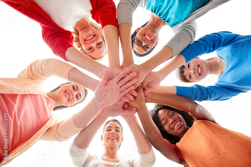 Canvas Print international group of women with hands together