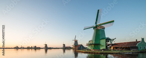 Traditional Dutch windmills with canal close