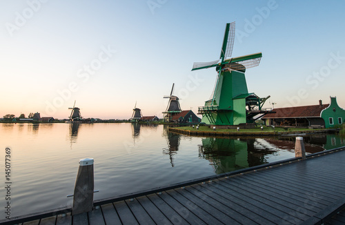 Traditional Dutch windmills with canal close