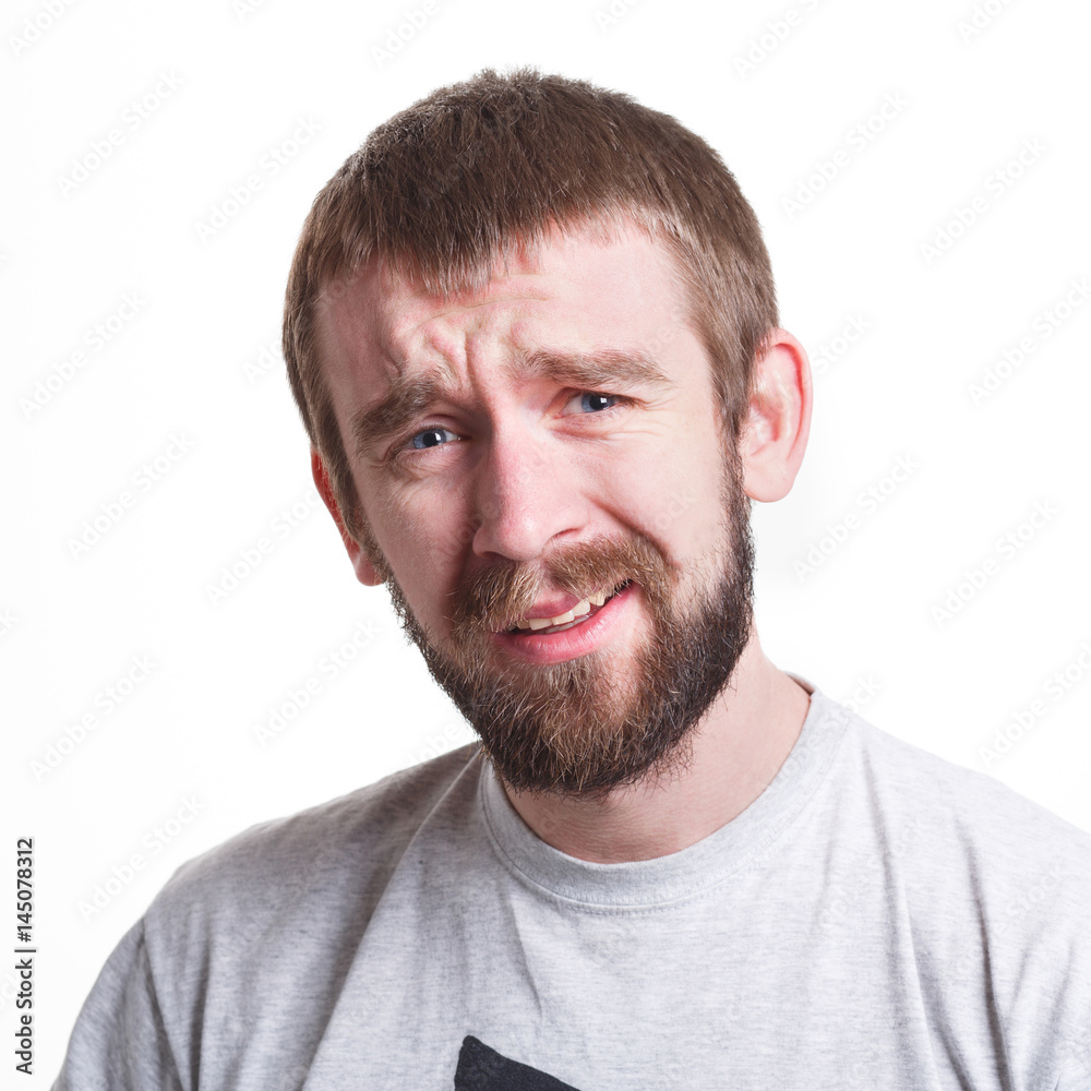 Unpleasant emotions, man feeling confused Unpleasant emotions, man feeling confused