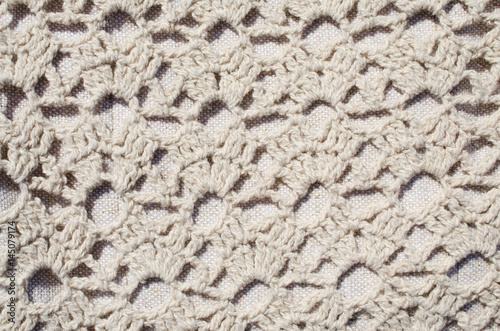 Beige Knitted Fabric Texture.