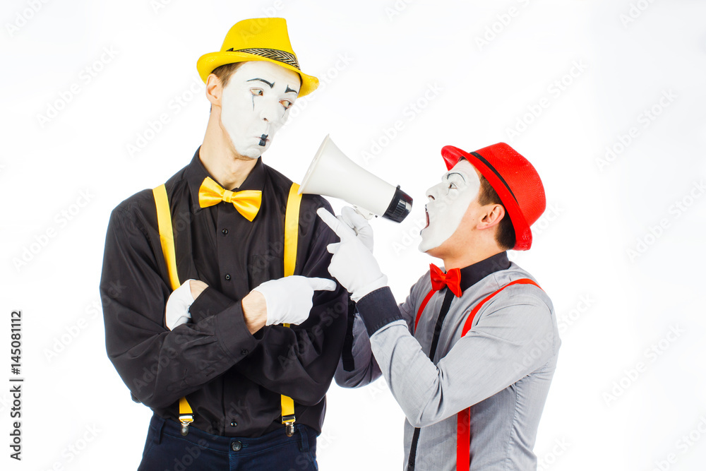 Two clown, MIME, flashy Megaphone. The expression of emotions. Two clown, MIME, flashy Megaphone. The expression of emotions.