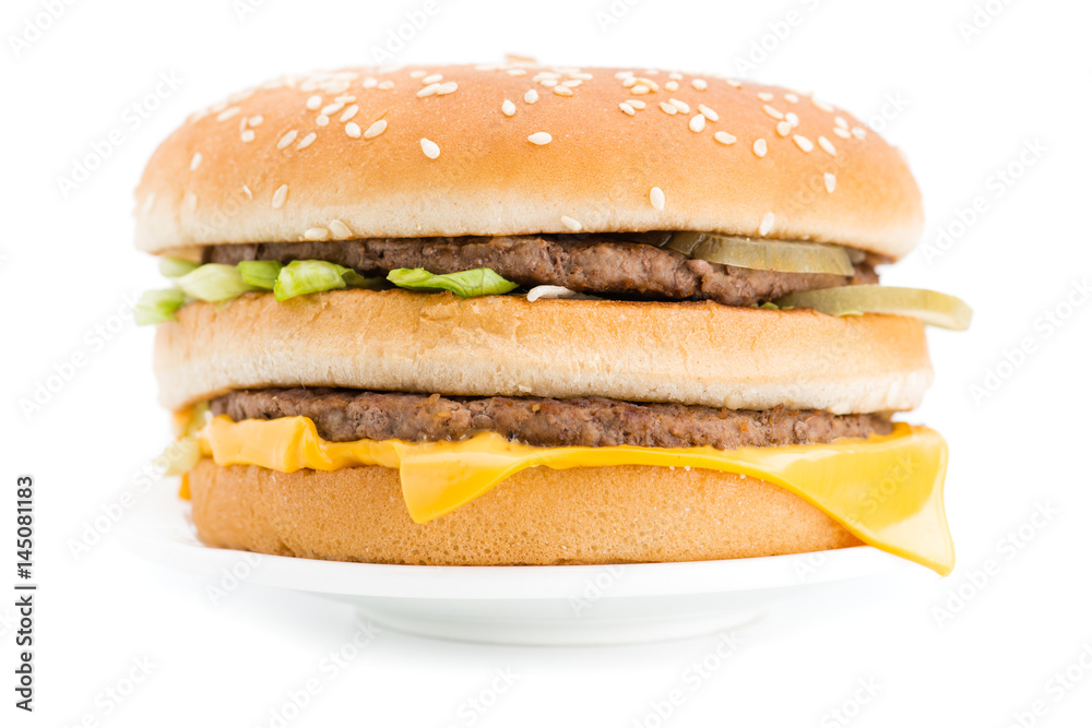 Fast food hamburger close-up isolated on white Fast food hamburger close-up isolated on white