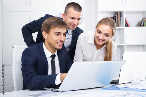 three business colleagues in office. © JackF