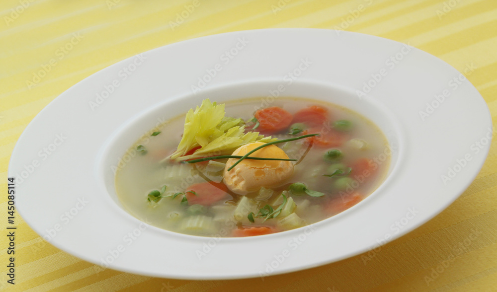 Vegetable spring soup with carrot, peas, celery and egg. Vegetable spring soup with carrot, peas, celery and egg.