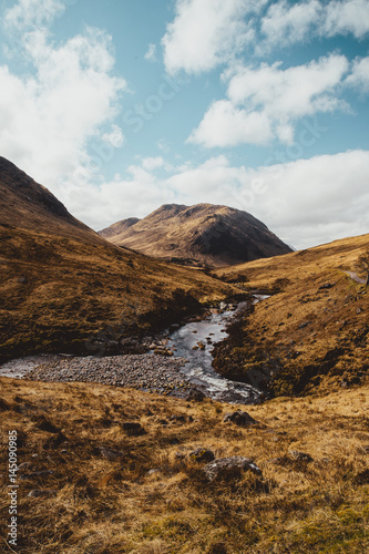 Glen Etive valley on sunny day in Scotland. Scottish Highlands.