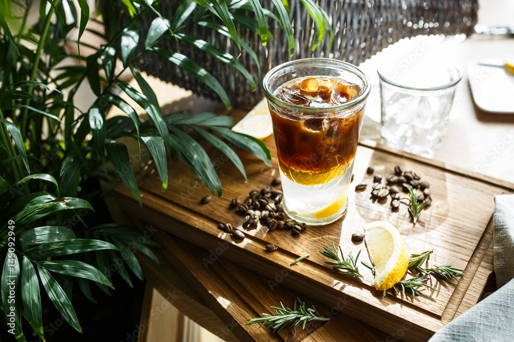 Coffee cocktail with lemon and tonic - obrazy, fototapety, plakaty 