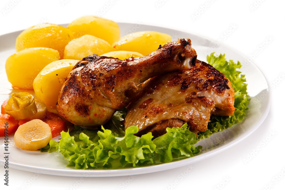 Roast chicken leg with potatoes