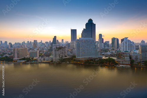 City skyscraper with sunrise view. © newroadboy