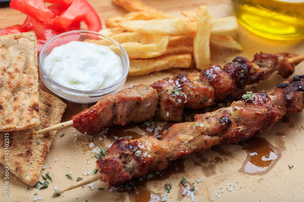 Grilled meat skewers on a table