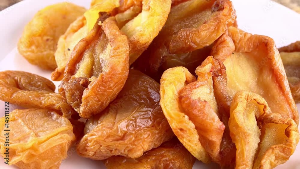 Portion of rotating dried Pears (seamless loopable) as 4K UHD footage Portion of rotating dried Pears (seamless loopable) as 4K UHD footage
