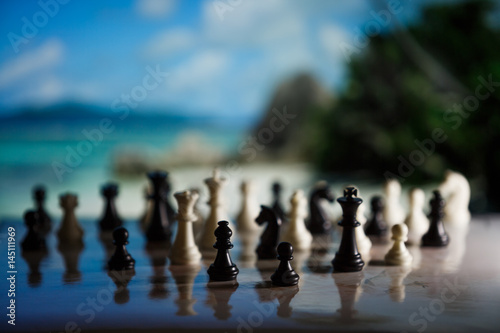 Chess strategy concept is on the bright background