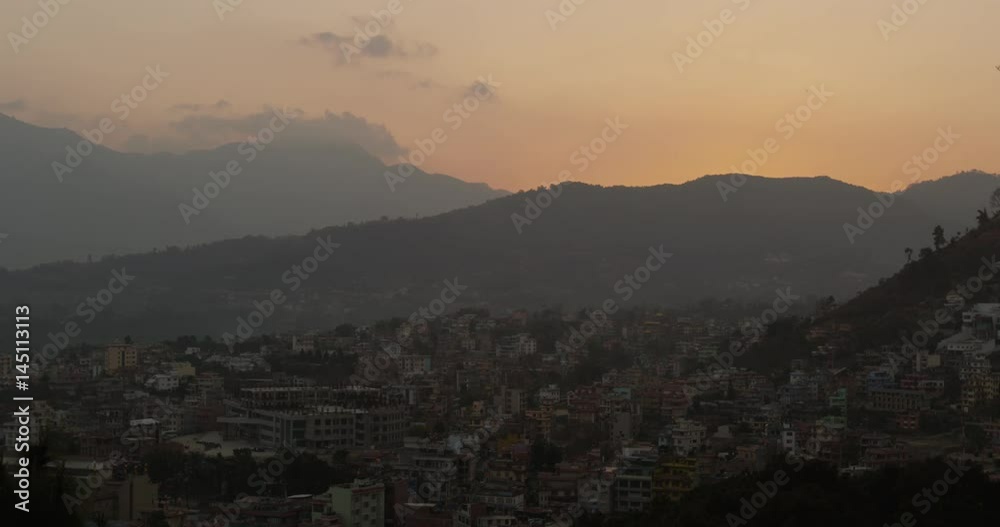 Kathmandu city skyline as seen from Swayambhunath (Monkey Temple) Stupa during sunset time. Kathmandu city skyline as seen from Swayambhunath (Monkey Temple) Stupa during sunset time.