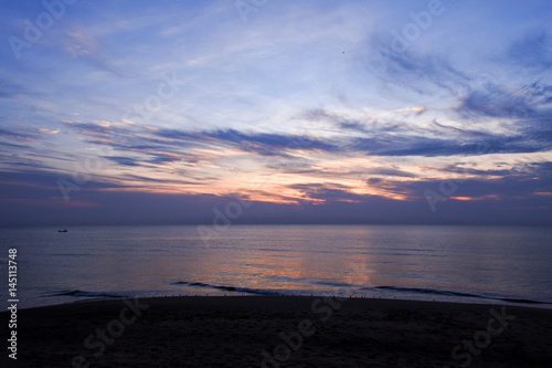 beautiful sunrise sky with sea and beach