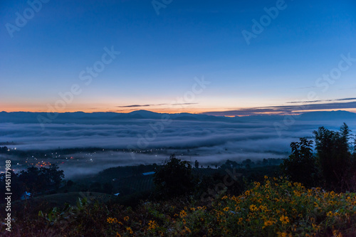 Sunrise and sea of clouds over Pai District Mae Hong Son, THAILAND. View from Yun Lai Viewpoint is located about 5 km to the West of Pai town centre above the Chinese Village.