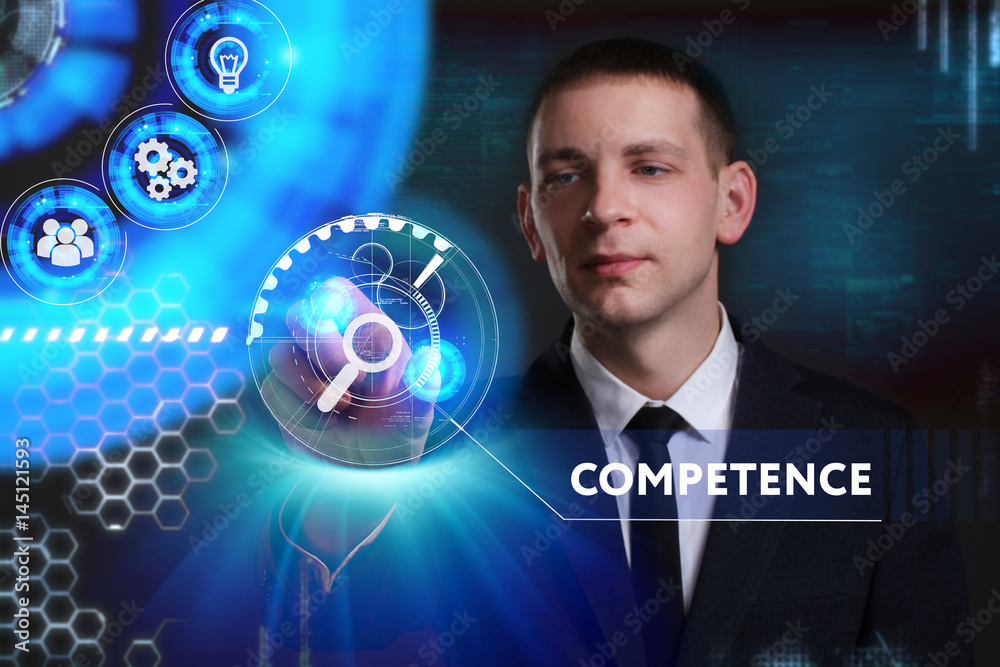 Business, Technology, Internet and network concept. Young businessman working on a virtual screen of the future and sees the inscription: Competence Business, Technology, Internet and network concept. Young businessman working on a virtual screen of the future and sees the inscription: Competence