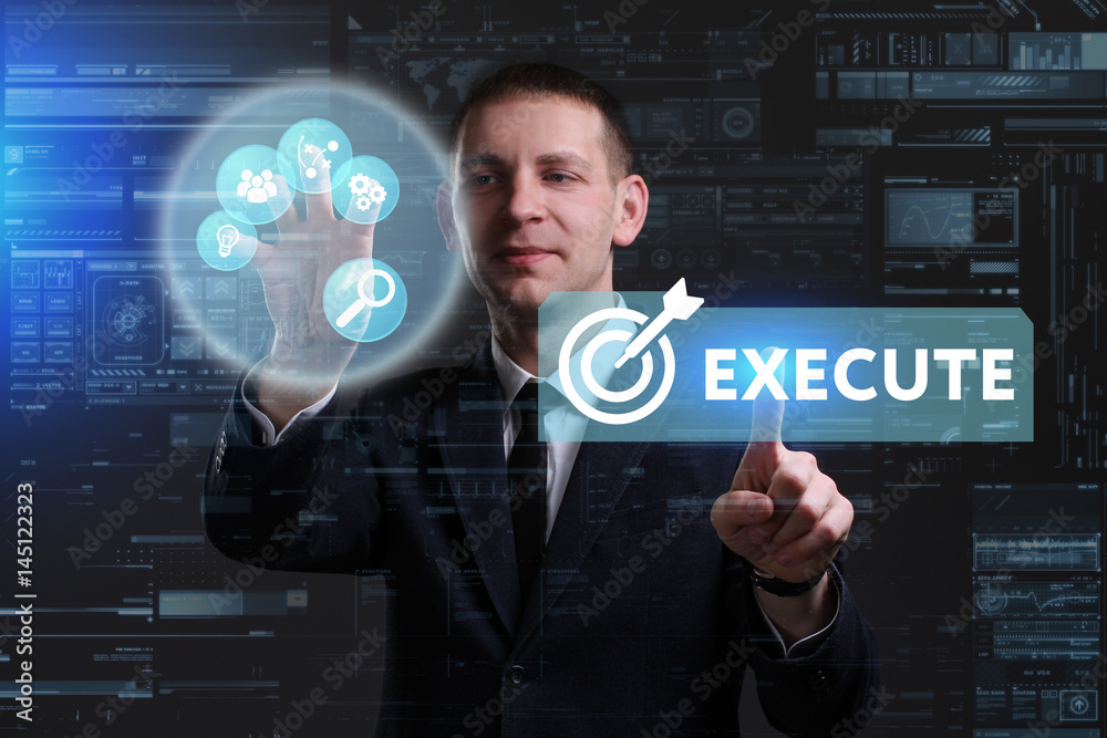 Business, Technology, Internet and network concept. Young businessman working on a virtual screen of the future and sees the inscription: Execute Business, Technology, Internet and network concept. Young businessman working on a virtual screen of the future and sees the inscription: Execute