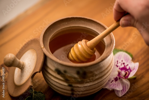 Honey Pot with Dripping Liquid Honey