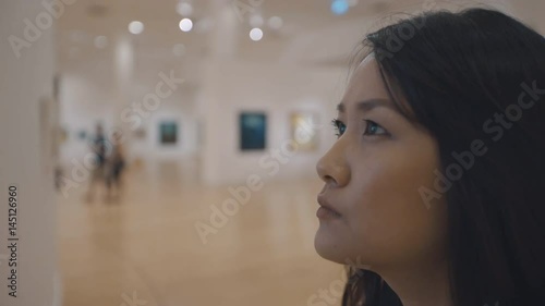 woman visiting art gallery