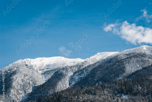 Fototapeta Naklejka Na Ścianę i Meble -  Scenic alpine landscape with snow capped mountains