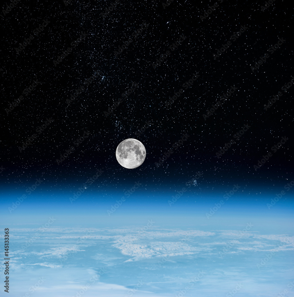Naklejka premium View of Moonset. Moon and the earth's atmosphere view from space (Elements of this image furnished by NASA)
