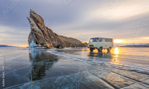 Frozen Lake Baikal near Ogoy island, Russia photo