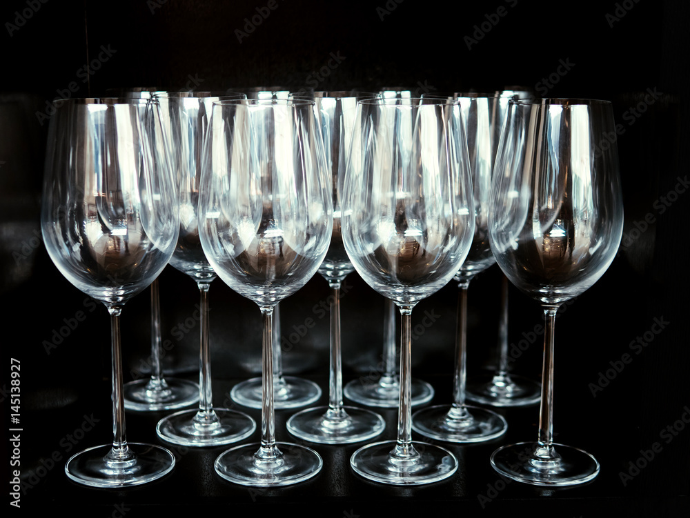 Wine glasses on shelf, selective focus