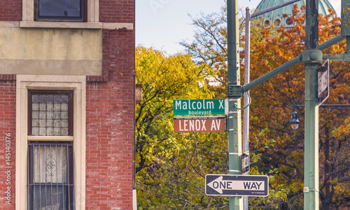 Lenox Avenue, also named Malcolm X Boulevard, both names are officially recognized, is the primary north south route through Harlem in the upper portion of the New York City borough of Manhattan. photo