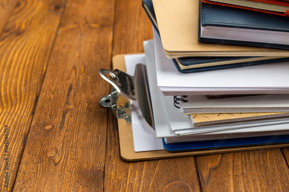 notepad on office wooden table