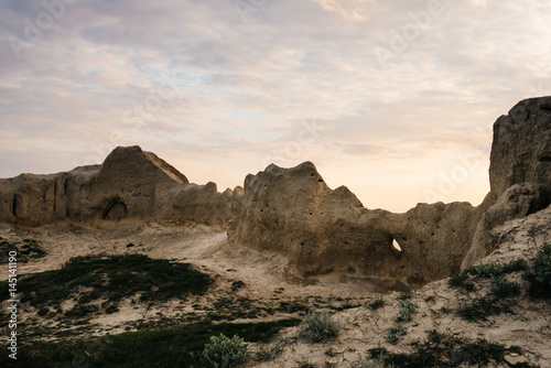 Sea and rock at the sunset. Nature composition.