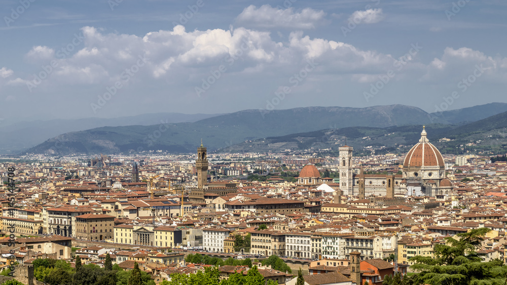 Beautiful aerial view of the historic center of Florence, Italy, from Piazzale Michelangelo, on a sunny day