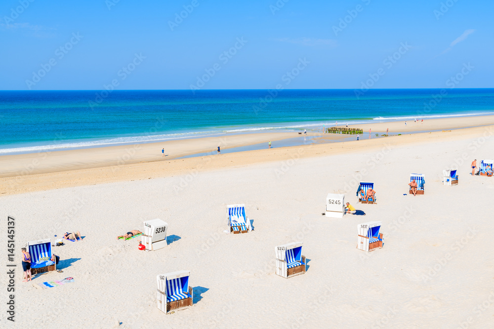 Wicker chairs on Westerland beach, Sylt island, Germany