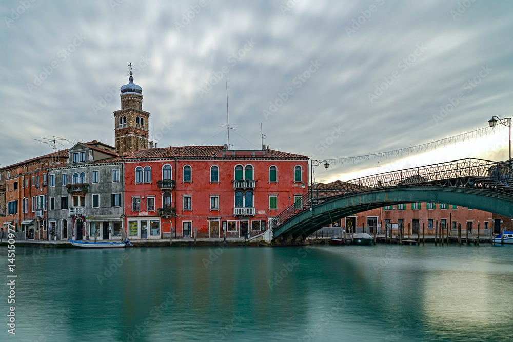 Murano cityscape with canal Ponte Lugno, Venice, Italy.