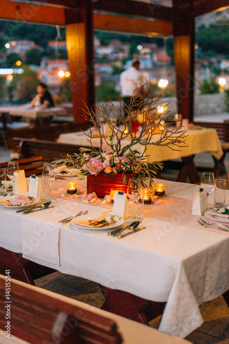 Wedding table In a restaurant outdoors. Wedding in Montenegro