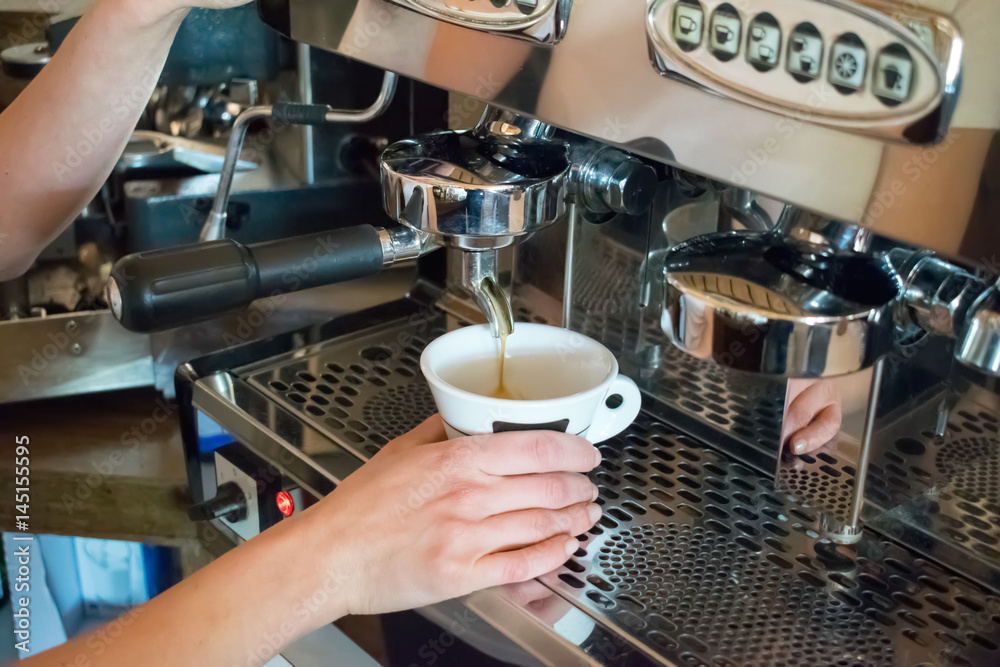 Espresso machine making coffee in pub, bar, restaurant Espresso machine making coffee in pub, bar, restaurant