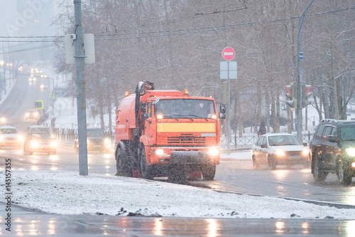 Road vacuum cleaner machine clean road side during snow in winter