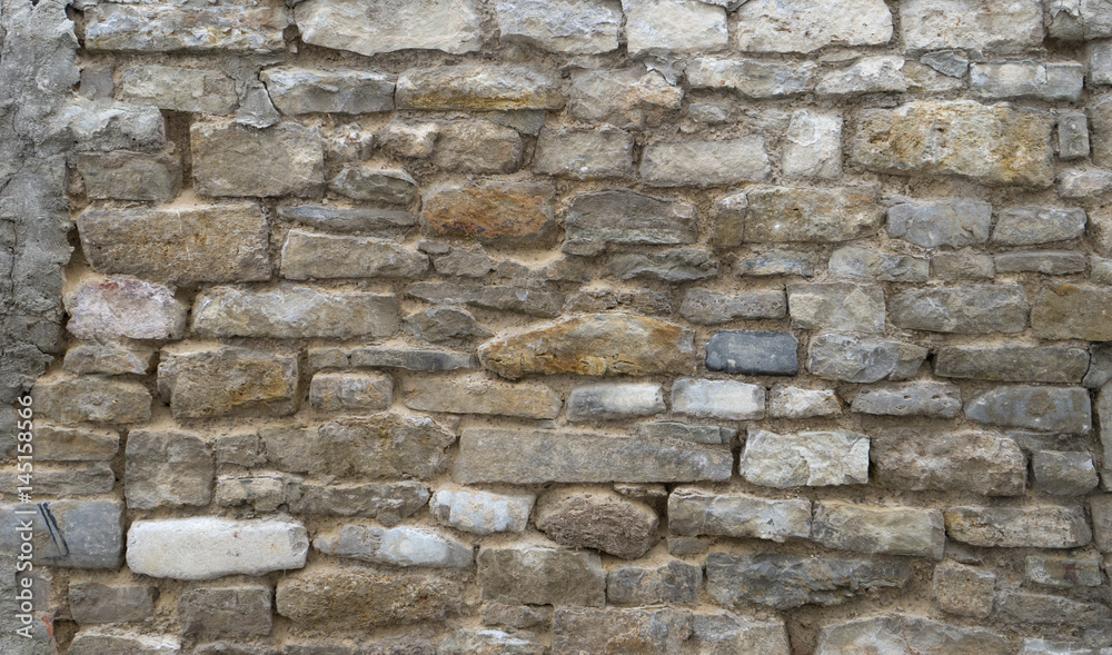wall / Unplastered wall made of natural stones wall / Unplastered wall made of natural stones