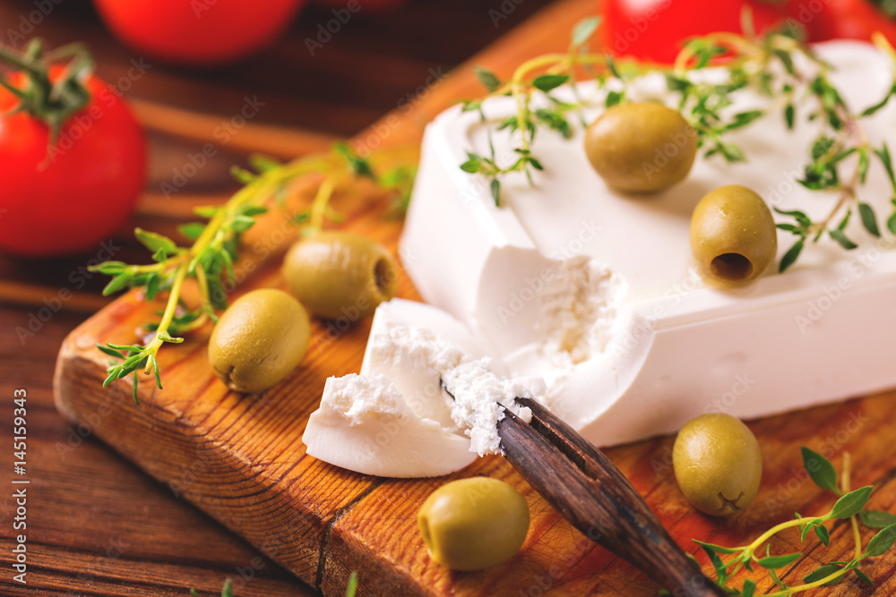 Greek cheese feta with thyme and green olives