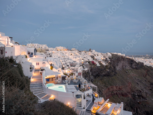 Fira in the afternoon with lights in the streets photo