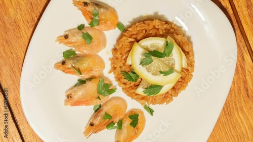 Mediterranean dish of rice with shrimps. Dish of fresh, ecological clean products