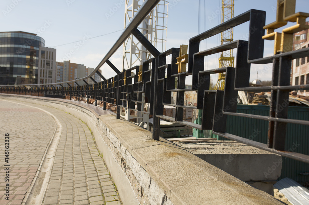 Bridge with metal fences and pavement Bridge with metal fences and pavement