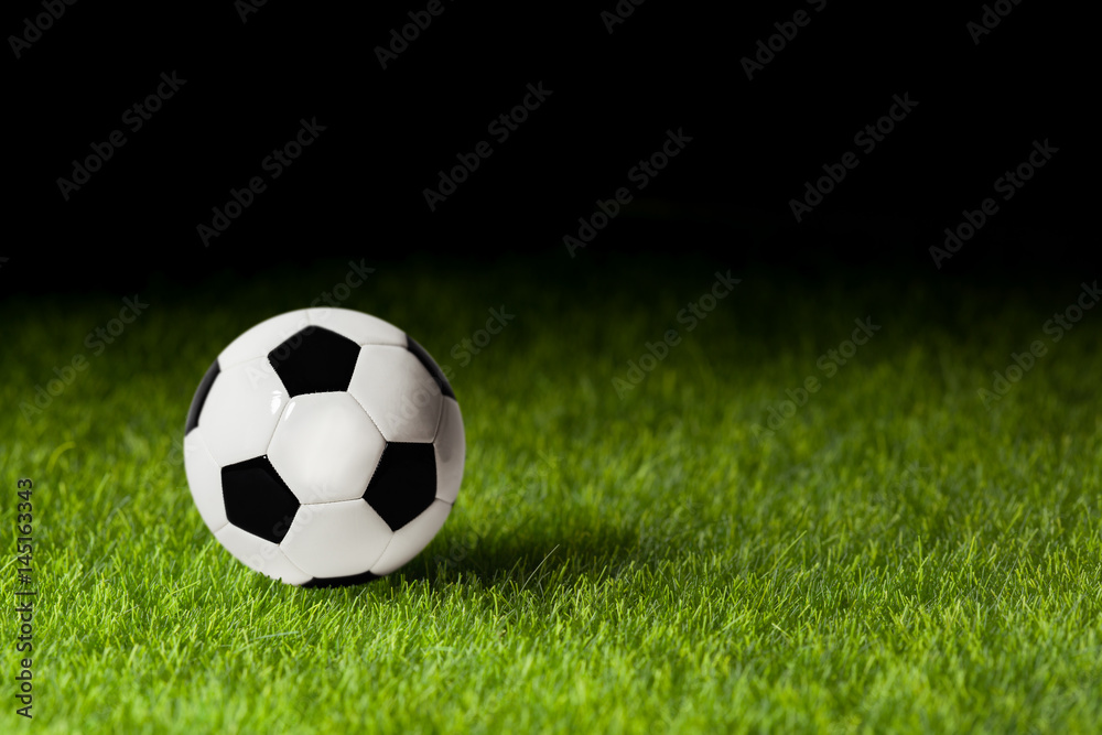 Soccer ball on the grass before the game Soccer ball on the grass before the game