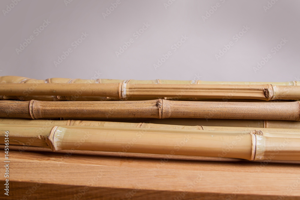detail of bamboo stalks on a wooden table