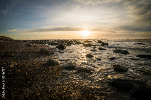 Sunset. Beautiful sunset at north sea. Gold sea sunset. Picture Sea sunset. Sea sunset background. Amazing sea sunset Sunset sea picture. Sunset sea waves. Summer sunset.