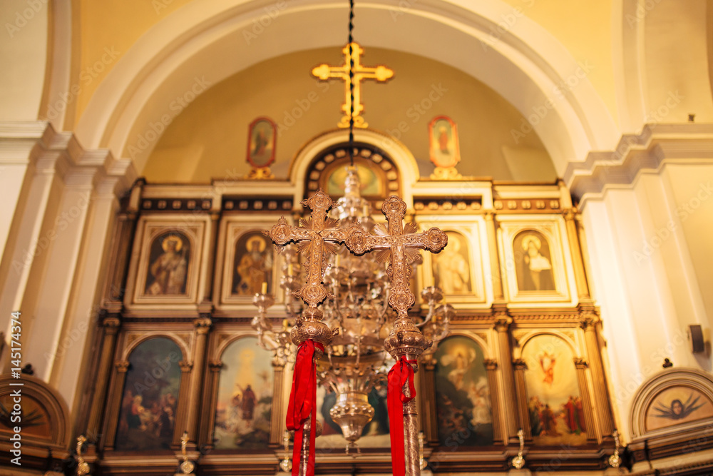 The interior of the church. Icons, chandelier, candles in a small Christian Orthodox church in Montenegro.