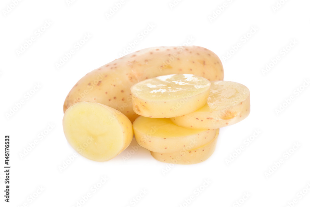 whole and sliced raw unpeeled potato on white background whole and sliced raw unpeeled potato on white background